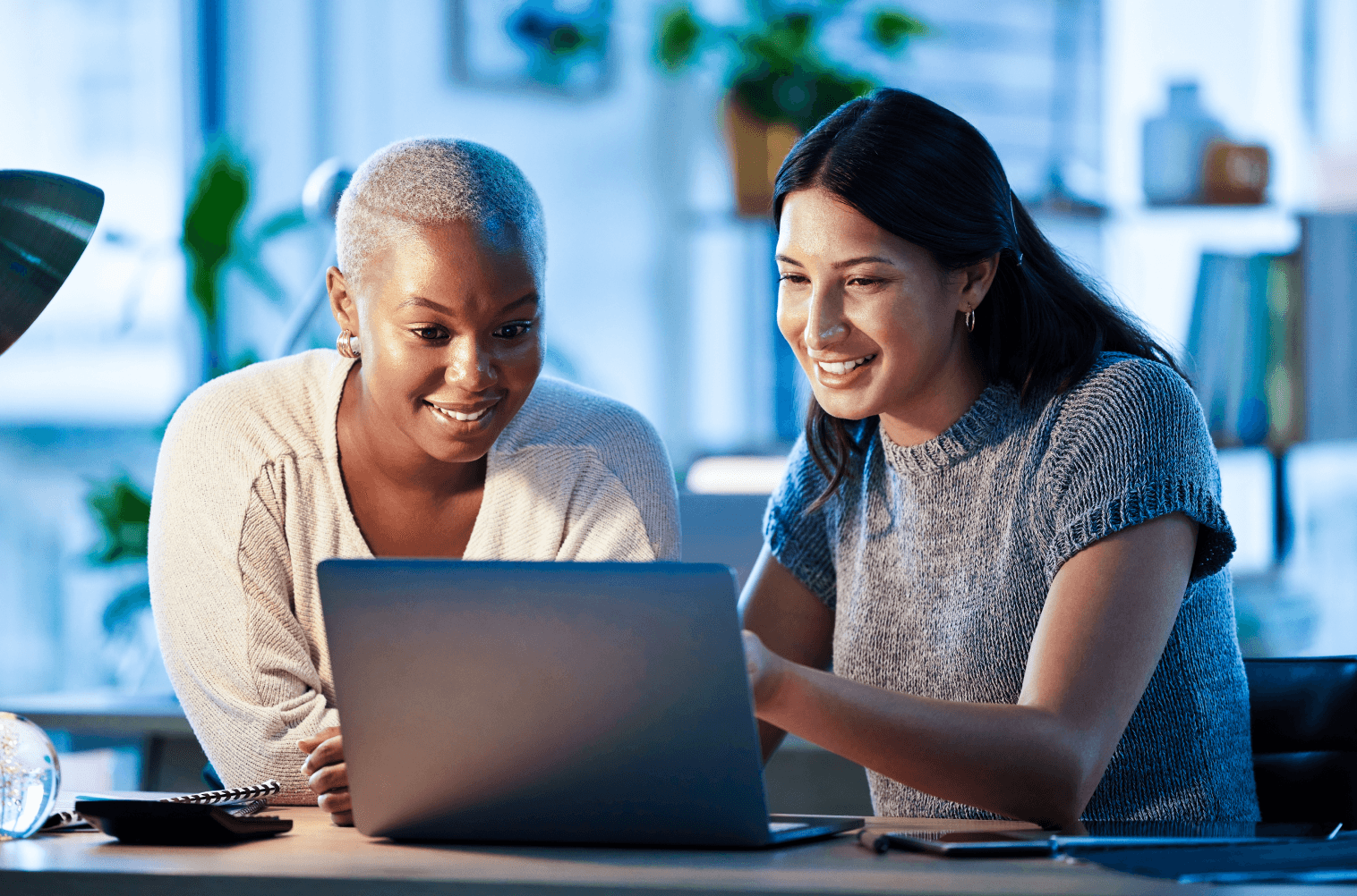 women looking at screen